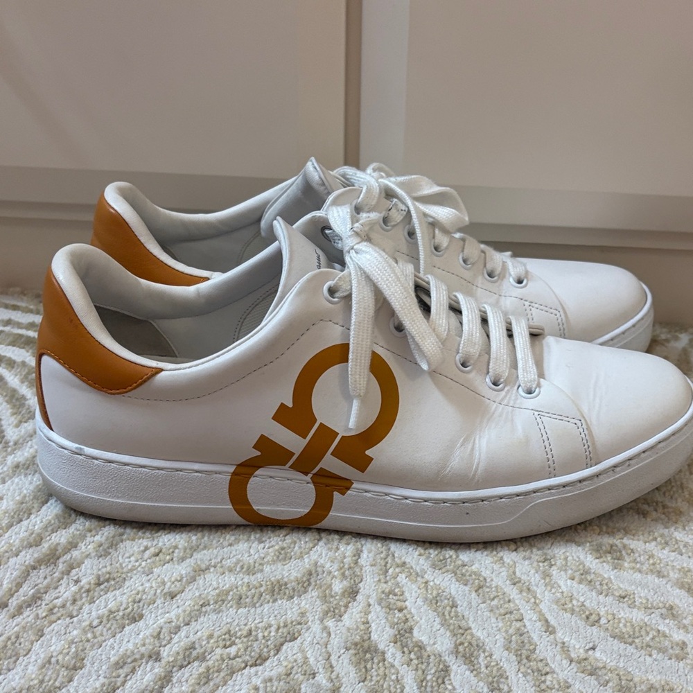 White Sneakers with Orange Logo